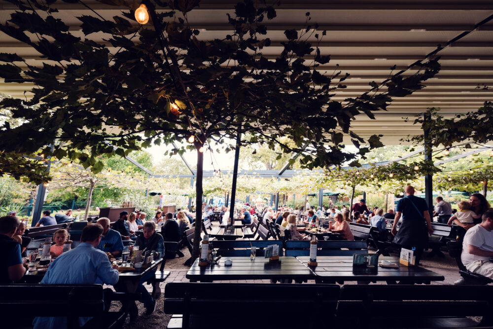 Spacious outdoor terrace at Luftburg Kolarik, perfect for enjoying a sunny day in Vienna's Prater.