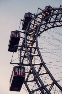 Spring sunshine highlighting the red cabins of the Giant Ferris wheel (Wiener Riesenrad).