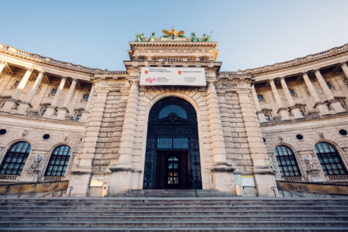 Elegant entrance of the Austrian National Library at Heldenplatz.