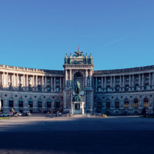Magnificent Neue Burg at Heldenplatz on a bright summer day.