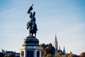 Historic Archduke Charles statue against the backdrop of Vienna's skyline at Heldenplatz.