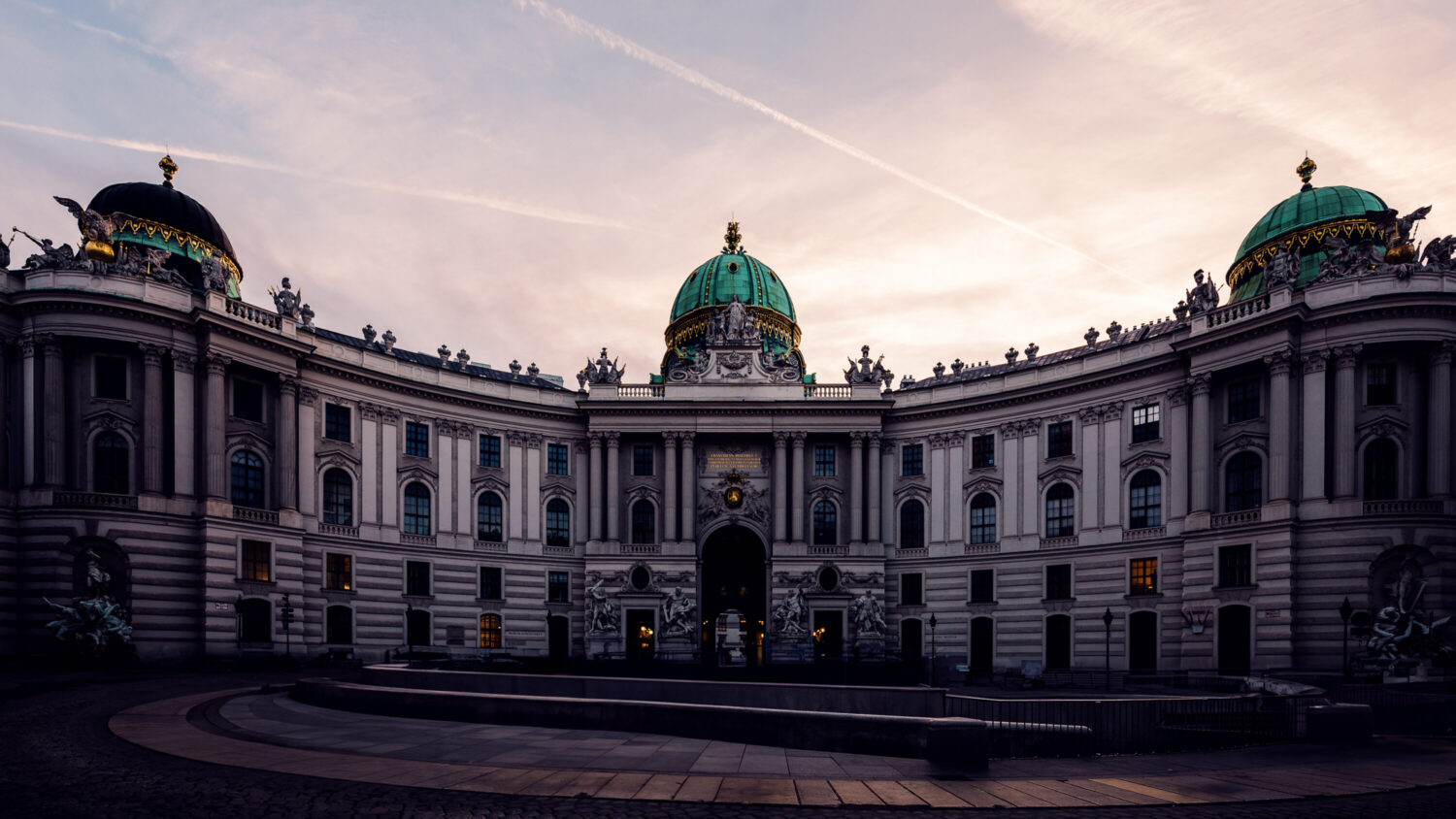 Panoramic view of the Hofburg from Kohlmarkt in Vienna.
