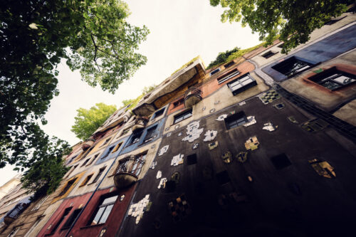 Hidden angles of Hundertwasserhaus revealing unexpected color combinations and architectural details.