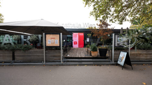 Glass facade and main entrance of the Kunsthalle Wien at Karlsplatz.