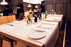 Sophisticated dining table at Plachutta zur Oper, where historic restaurant tradition meets fine dining excellence.