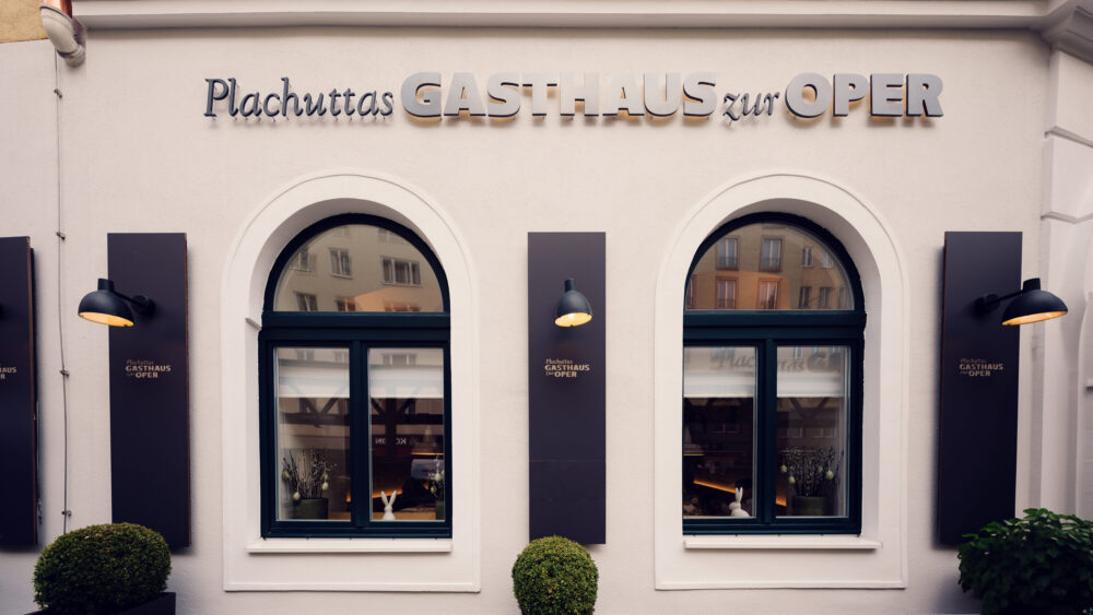 Elegant entrance of Plachutta's Gasthaus zur Oper.