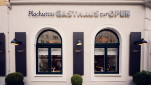 Elegant entrance of Plachutta's Gasthaus zur Oper.
