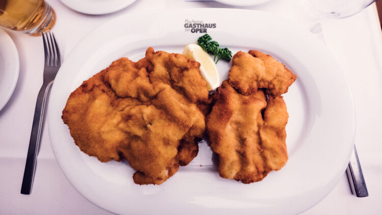 Artfully prepared Wiener Schnitzel presentation at Plachuttas Gasthaus zur Oper.