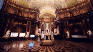 Panoramic view of the Prunksaal's complete interior, best captured during early opening hours.