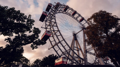Giant Ferris Wheel (Wiener Riesenrad) bathed in golden hour light.