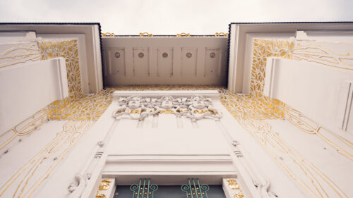 Detail of the ornate entrance to the Vienna Secession Building showing Art Nouveau decorative elements and metalwork.