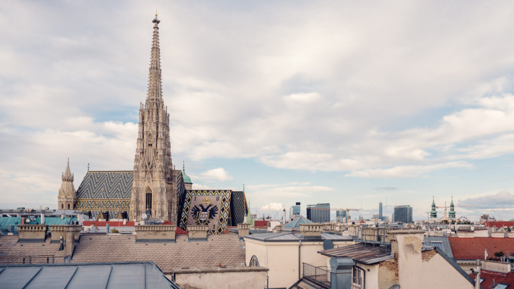 Panoramic view of St. Stephen's Cathedral from Sky Bar & Roofgarden at Steffl, highlighting its architectural beauty.
