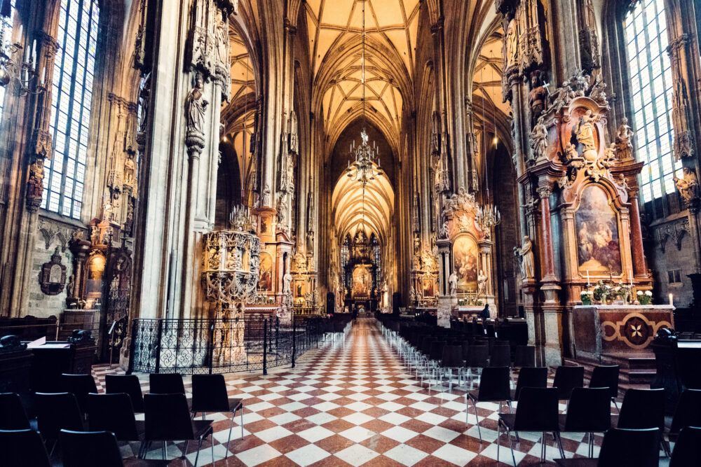 Geometric patterns of the tiled floor leading to the altar of St. Stephen's Cathedral.