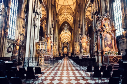 Geometric patterns of the tiled floor leading to the altar of St. Stephen's Cathedral.