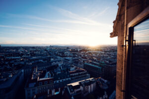 Panorama of Vienna's historic skyline from St. Stephen's Cathedral tower platform.