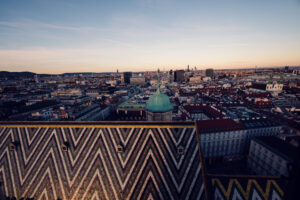Evening light on the St. Stephen's Cathedral towers casting long shadows.