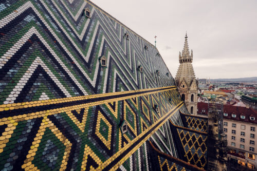 Zigzag-patterned roof of St. Stephen's Cathedral with its colored tiles.