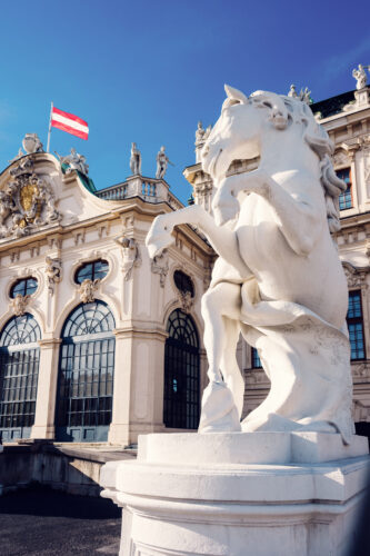 Baroque sculptural groups flanking Belvedere Castle's entrance.