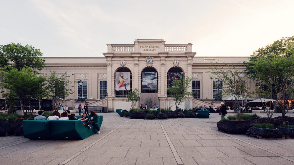 Architectural details of historic facade at MuseumsQuartier meeting contemporary design elements.