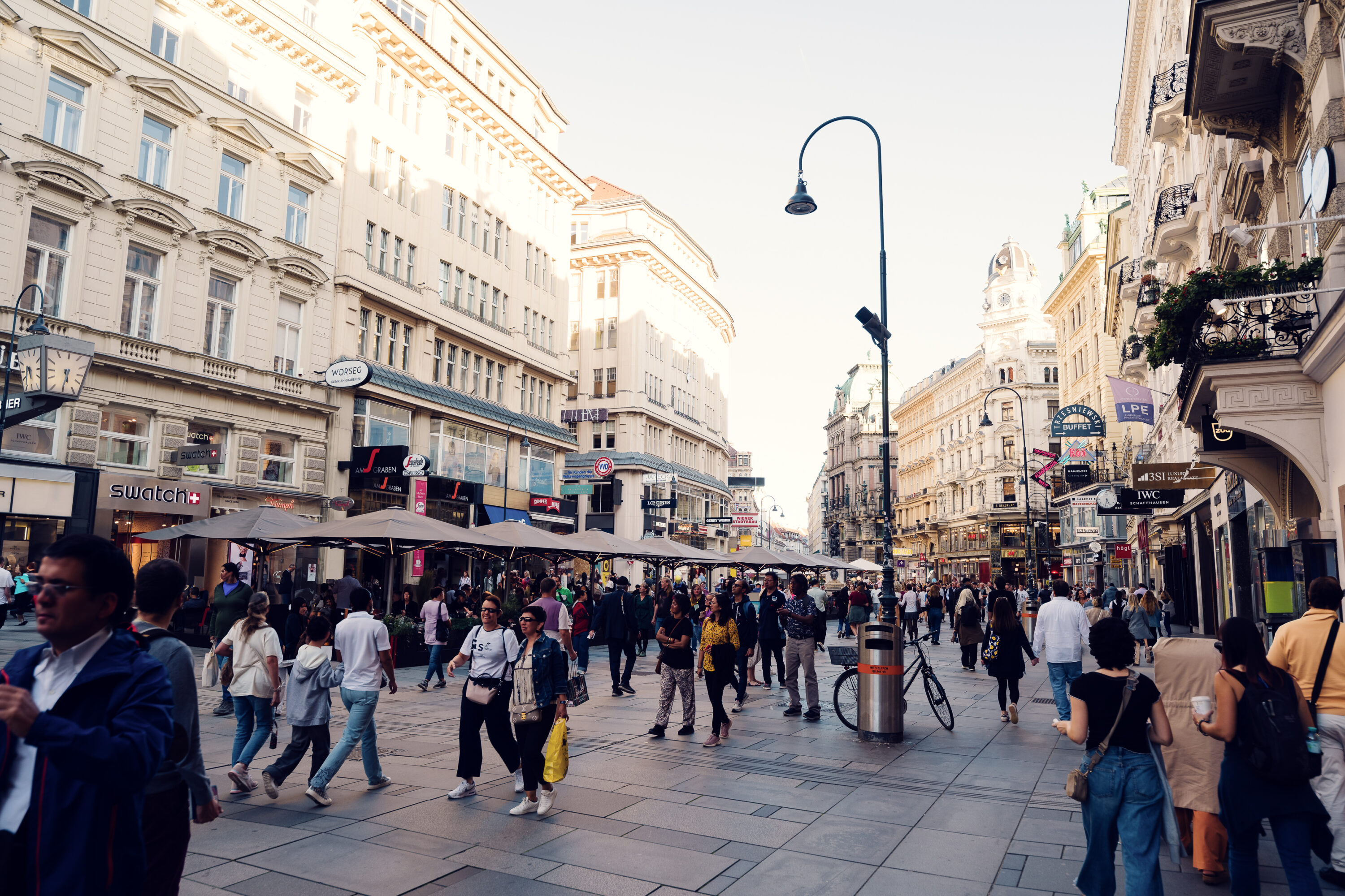 The Graben street in Vienna is a lively and historic boulevard lined with cafés, shops, and grand architecture, offering a vibrant mix of culture, shopping, and dining.