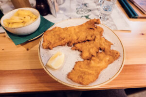 Crispy Wiener Schnitzel at Heuriger Mayer am Pfarrplatz, an Austrian classic.