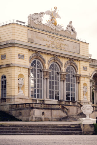 Intricate architectural details of the Gloriette's central pavilion, showcasing the masterful craftsmanship of Habsburg imperial style.