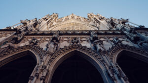 Close-up of Votivkirche Vienna's weathered stone showing the texture and patina developed since its completion in 1879.