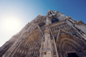 Detailed view of Votivkirche Vienna's buttresses and supporting structures showing the engineering behind the neo-Gothic design.