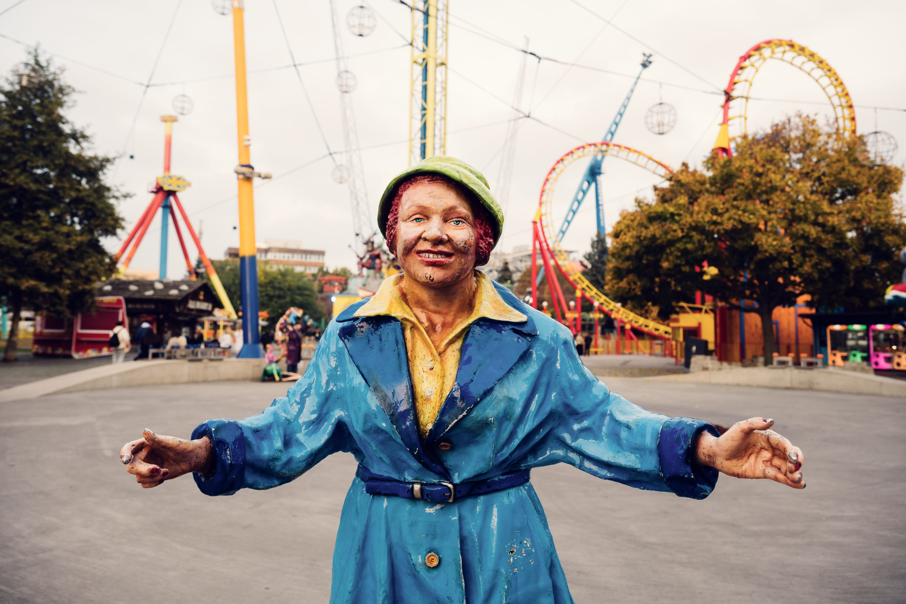 Funny carnival figure at Prater Vienna Austria, colorful amusement park character decoration with humorous design in historic Wiener Prater entertainment district.