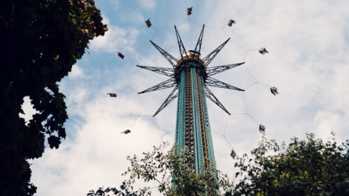 Prater Tower carousel Vienna, tall rotating ride with elevated gondolas and views over Vienna in the Wiener Prater.