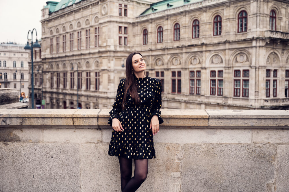 Adriana at the Albertina terrace with the Vienna State Opera in the background.