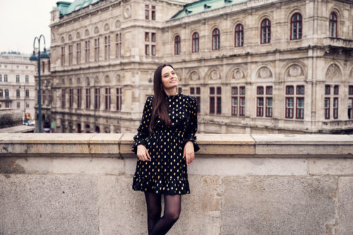 Adriana at the Albertina terrace with the Vienna State Opera in the background.