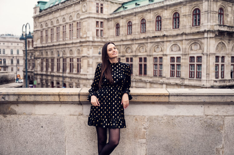 Adriana at the Albertina terrace with the Vienna State Opera in the background.