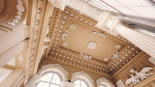 Close-up of the ornate ceiling with medallions and sculptures inside Café Gloriette.