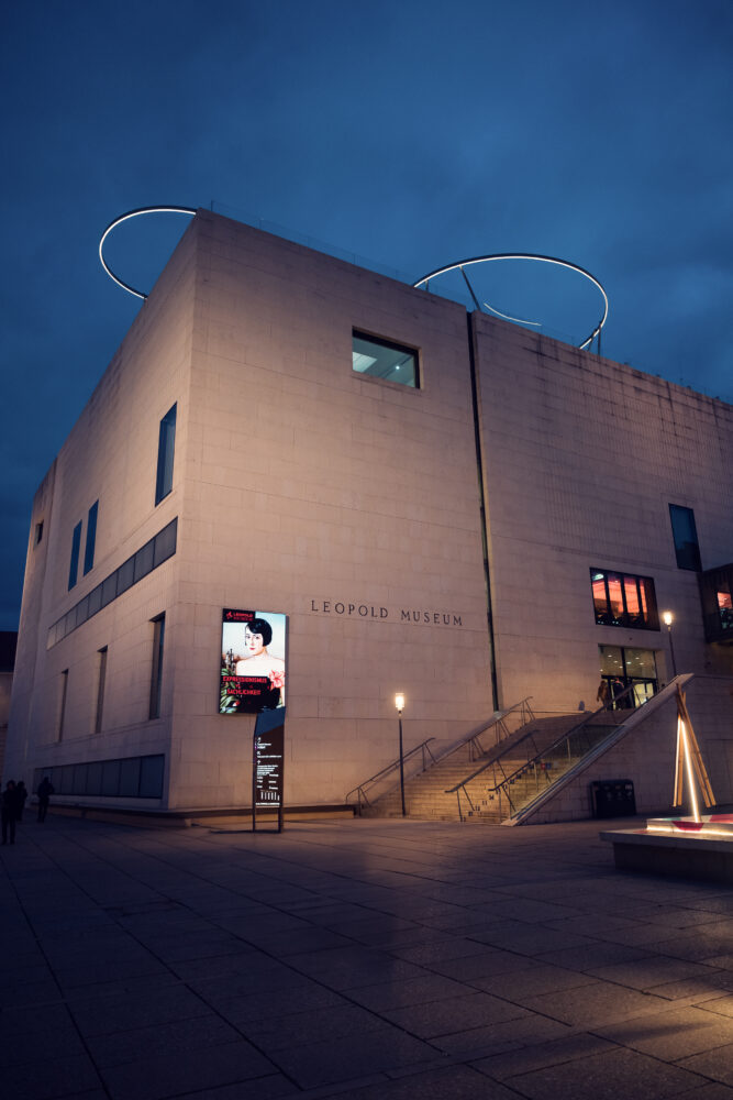Corner perspective of Leopold Museum Vienna showing the sharp geometric lines and white cube design by architects Ortner & Ortner.