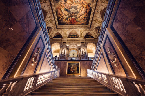 Grand main staircase at Natural History Museum Vienna (Naturhistorisches Museum Wien), featuring marble steps and ornate Renaissance Revival architecture.