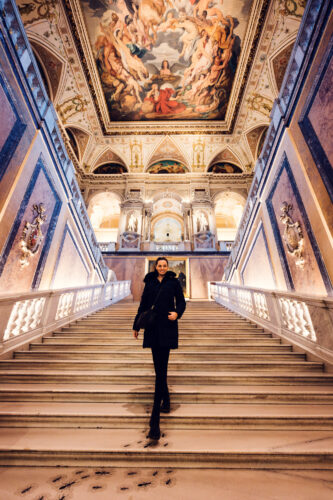 Adriana posing on main staircase at Natural History Museum Vienna (Naturhistorisches Museum Wien), photographed on marble steps.