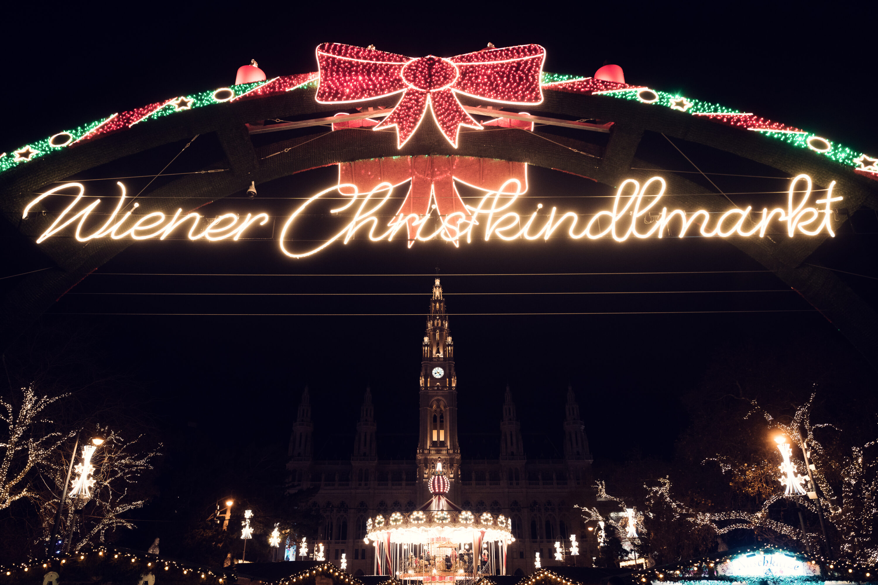 Vienna City Hall (Rathaus) Christmas Market with its famous illuminated heart archway entrance.