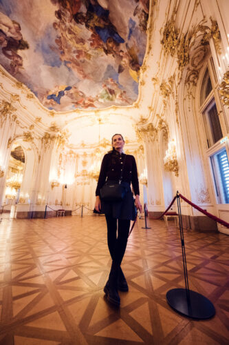 Adriana posing in Schönbrunn Palace (Schloss Schönbrunn) baroque interior.