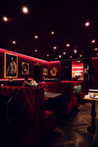 Chic and inviting atmosphere of Café Sacher Bel Étage, perfect for enjoying a slice of Sacher Torte.