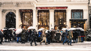 Winter scene at the entrance of Hotel Sacher, with snow adding a magical touch.