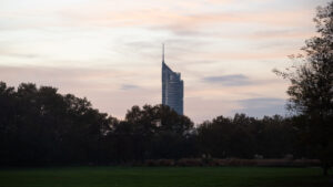 Millennium Tower seen across the treetops from Donaupark.