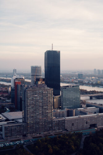 DC Tower and Donau City skyline seen from the Donauturm with the Danube River in the background.