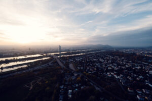 Warm sunset light behind the Donauturm tower in Vienna.