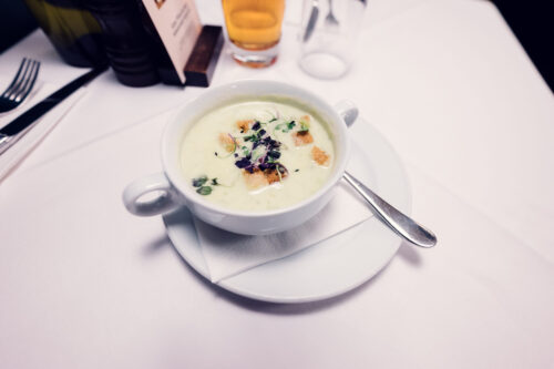Seasonal soup served at Figlmüller Bäckerstrasse with traditional Austrian flavors.