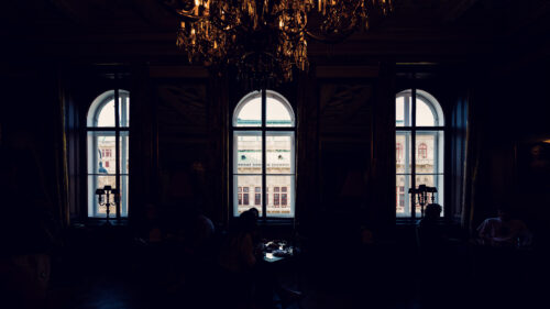 Elegant and inviting interior of Gerstner K. u. K. Hofzuckerbäcker, perfect for a leisurely afternoon.