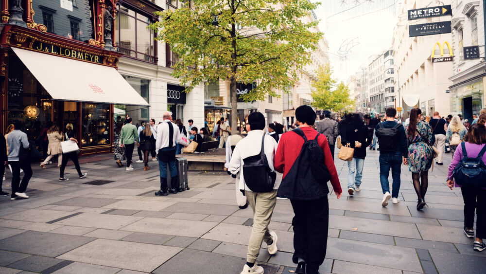Elegant Kärntner Straße in summer splendor, where historic facades and modern boutiques create a perfect shopping backdrop.