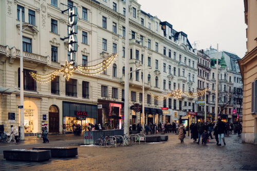 Mariahilfer Strasse Vienna Christmas decorations with festive street lighting holiday shoppers and seasonal illuminations Austria's main shopping street.