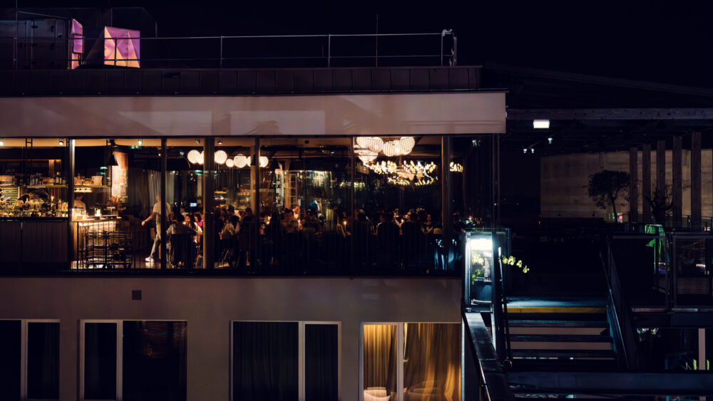 Chic rooftop setting at Neni am Prater, providing a unique dining experience with panoramic views.