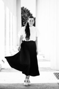 Adriana between the columns of Theseustempel in Vienna Volksgarten.